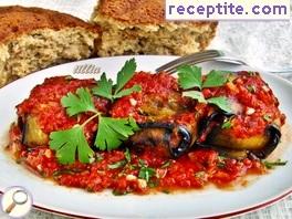Dolmas of patlazhdani and minced meat with tomato sauce