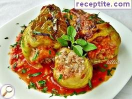 Stuffed peppers with rice and minced meat with tomato sauce