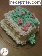 Decoration of layered cake with cream