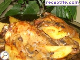 Juicy chicken with potatoes in mushroom sauce