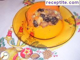 Stuffed pumpkin with fruit, rum and coconut