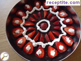 Chocolate layered cake with strawberries