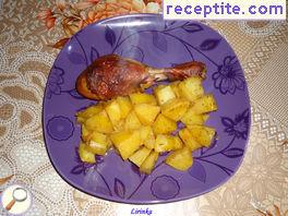 Chicken with potatoes in the oven