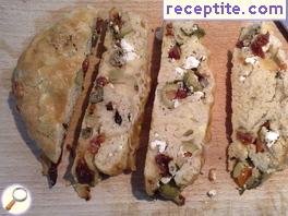 Pita with dried tomatoes, feta cheese and olives - II type