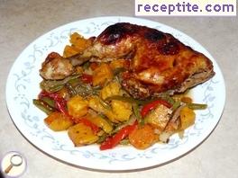 Chicken with sweet potato and vegetables in the oven