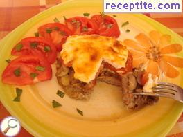 Lazy meat in French with mushrooms and tomatoes