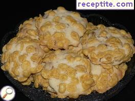 Cookies with pine nuts and flakes