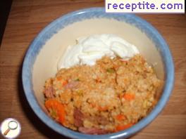 Pilaf of oat grains with smoked pork neck