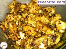 Cauliflower with chickpeas and curry oven