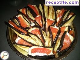 Rolls of eggplant with tomatoes