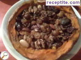 Stuffed baked pumpkin with honey and walnuts