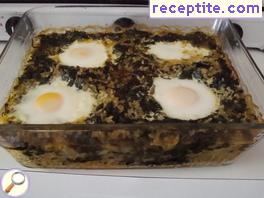 Spinach with eggs in the oven