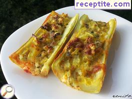 Stuffed zucchini with eggs and cheese