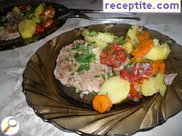 Pork chops with potatoes in the oven