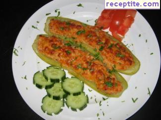 Stuffed zucchini with eggs, feta cheese and pepper