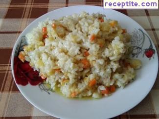 Zucchini with carrots and rice in sauce