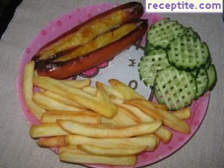 Baked skinless sausages with cheese
