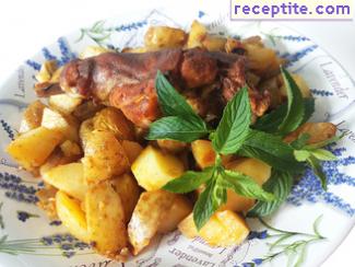 Rabbit roasted with baby potatoes